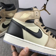Close-up of the ankle collar, winged emblem, stitching, and black heel panel.