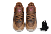 Brown pair shown from above with patterned uppers, burgundy tongue details and black laces.