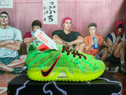 Side view showing the neon green textured upper, red-and-black Nike swoosh, and visible ZoomX marking.