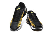 Top view of a pair of black and yellow Nike Air Max Plus III sneakers.