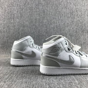 Rear three-quarter view showing the padded collars, heel panels and white midsoles.