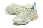 Angled top view of pale green Nike Air Max 270 Premium sneakers.