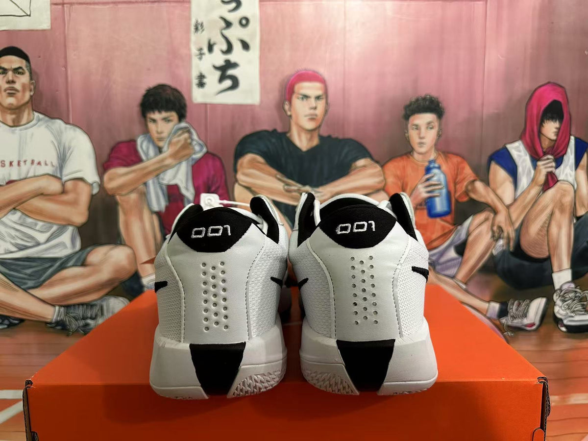 Rear view of white and black Nike basketball shoes