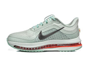 Side view of a mint and silver Nike Pegasus Premium running shoe with black Swoosh and visible AIR ZOOM lettering.