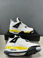 Jordan Air Jordan 4 sneakers shown from side and underside angles, highlighting the patterned rubber outsole and yellow outsole logo.