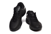 Pair of black low-top basketball sneakers shown from the front and three-quarter view.