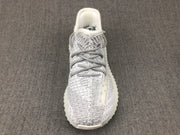 Top-down view showing the knit-style toe box, laces and padded tongue.