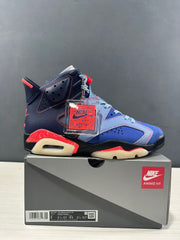 Side view of the sneaker above its box; the box label visibly includes AIR JORDAN 6 RETRO SP, AWAKE NY, and size information for the photographed sample.