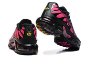 Rear view showing the black and pink panels and sculpted sole