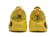 Rear view of the yellow sneakers showing padded heels, pull tabs and contrasting heel details.