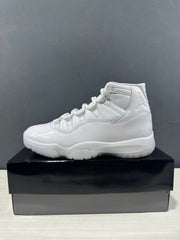 Side profile of a white high-top sneaker with Jordan branding and a translucent outsole.