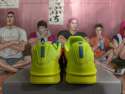 Rear view showing the yellow heel panels and contrasting dark vertical heel details.