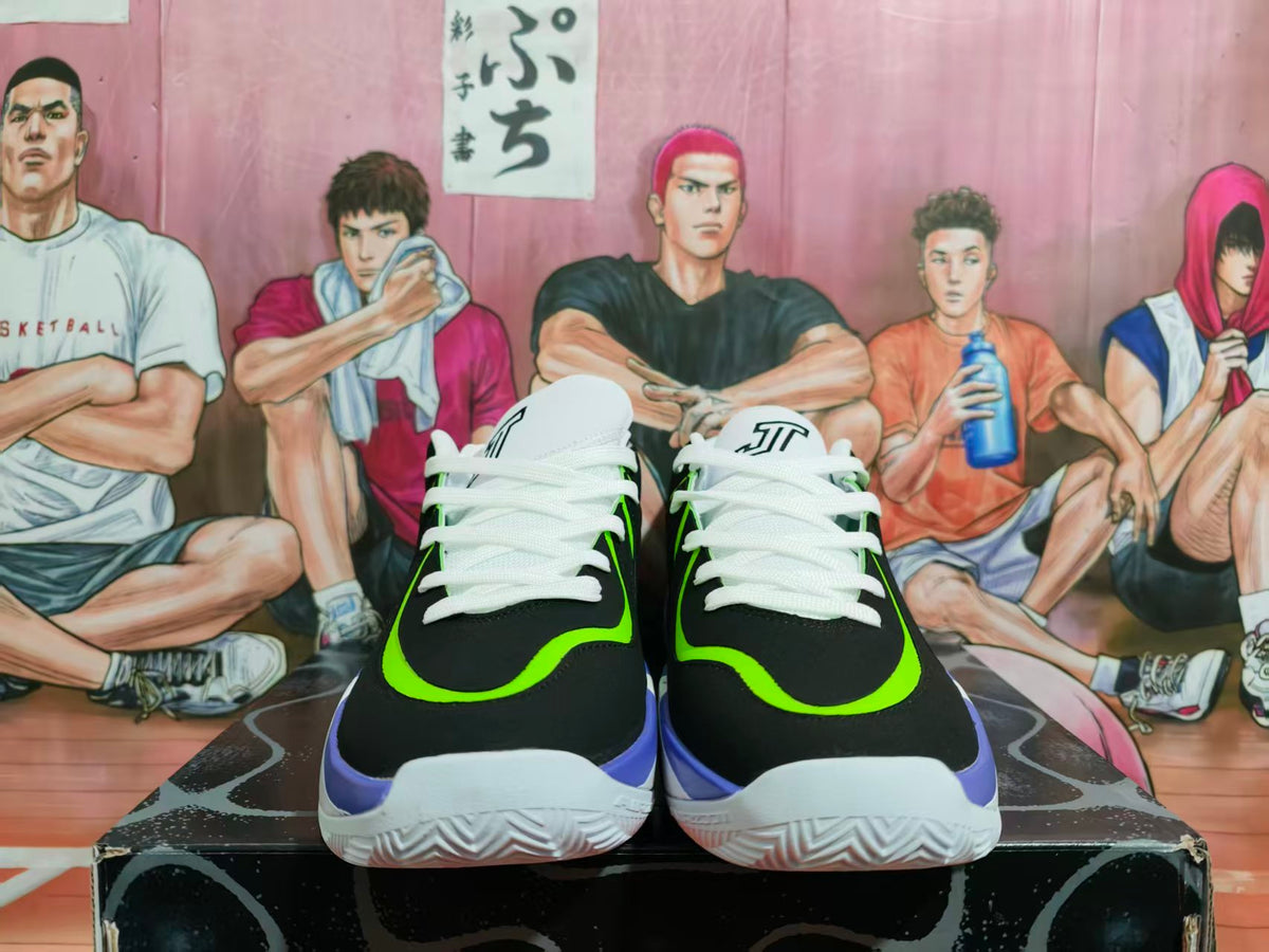 Front view of black, white, purple, and lime Jordan basketball shoes