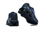 Rear and outsole views of the Nike Shox Ride 2 sneakers, showing the column-style heel sole.
