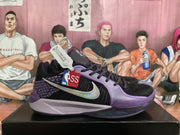 Side view of one black and purple sneaker showing the Nike Swoosh, patterned heel area, and layered midsole.