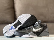 Nike Kobe 7 sneakers shown from the outsole and side, with white traction sections and blue Kobe branding.