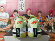 Rear view showing the heel branding, layered heel structure, and translucent green outsole.