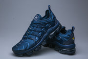 Blue Nike Air VaporMax Plus TN-15 sneakers arranged to show the side and heel.