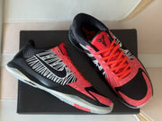 Pair of black, white, and red Kobe 5 shoes viewed from above