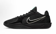 Black Nike low-top basketball sneaker with a white Swoosh and sculpted black outsole.