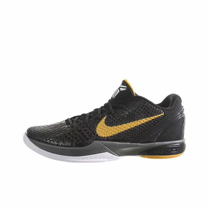 Black Kobe 6 sneaker with a gold Swoosh, gray translucent outsole, and gold heel accent.