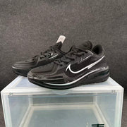 Pair of black basketball sneakers showing the silver side branding, laces, and textured uppers.