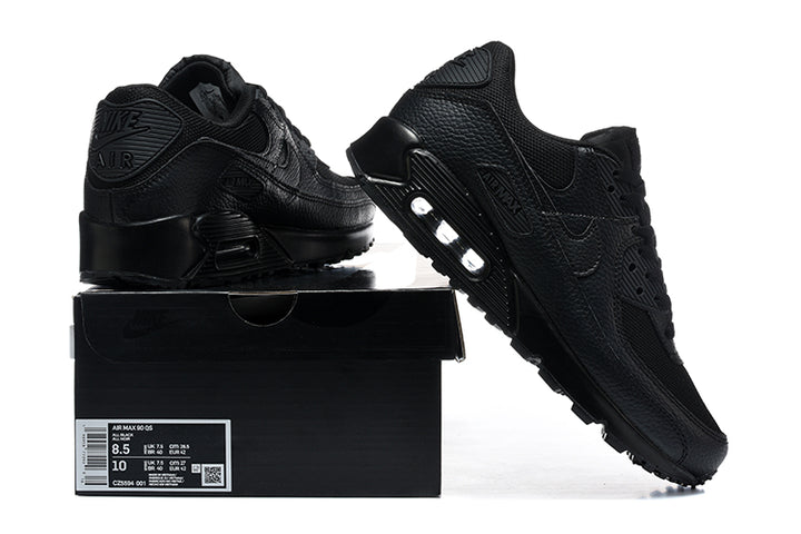 Black Nike Air Max 90 sneakers displayed with a black shoe box and size label.