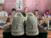 Rear view of gray Nike Kobe basketball shoes with heel detailing
