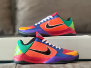 Side view of one shoe with the second shoe in the background