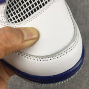 Close-up of the white toe panel and double-row stitching on the sneaker.