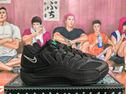 Side profile of a black Nike sneaker with textured overlays and a white Swoosh logo