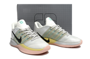 Pair of white and green Nike Sabrina 3 shoes shown from the front