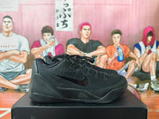 Side view of black Nike Kobe basketball shoes