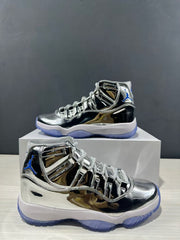 Detailed angled view of the reflective silver and black high-top sneaker pair.