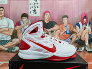 White and red Nike Hyperdunk high-top basketball shoe shown in profile.