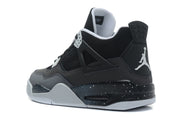 Rear three-quarter view showing the black heel panel, white Jordan logo and speckled midsole.