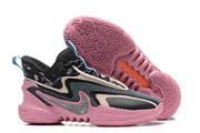 Black and pink Nike Anthony Edwards 2 basketball shoes with blue lace details.