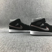 Rear-side view of the pair highlighting the grey collar panels, black heel sections and white midsoles.