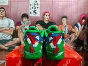 Rear view of green Nike basketball sneakers with multicolor heel panels and green textured midsoles.