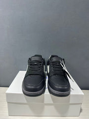 Front view of the pair showing black laces, perforated toe panels, and rounded toes.