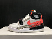 Outer side profile highlighting the high-top shape, coral and elephant-print overlays, black heel section, and visible air unit.