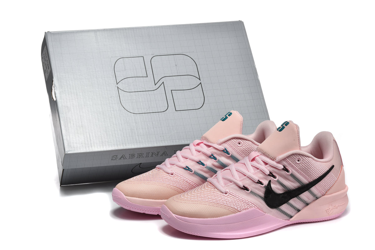 Pair of pink Nike Sabrina 2 basketball shoes beside a Sabrina shoe box