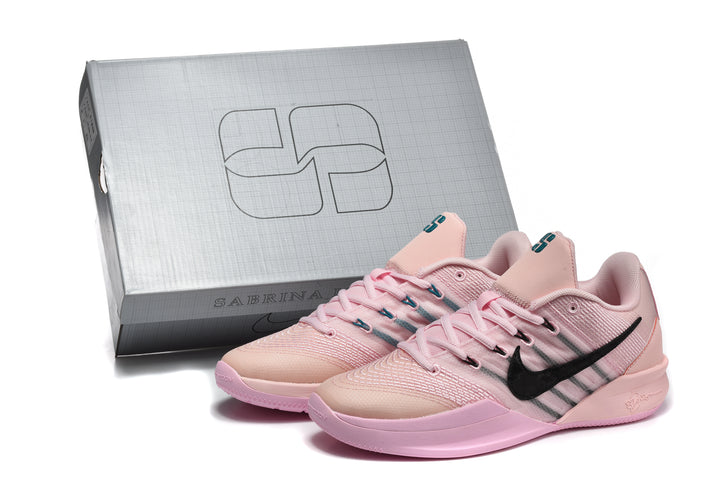 Pair of pink Nike Sabrina 2 basketball shoes beside a Sabrina shoe box