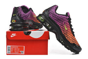 Nike Air Max Plus VI sneakers in an orange-to-purple gradient with black details, shown with a Nike shoe box.