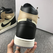 Close-up rear view showing the black collar, beige upper, and white midsole.