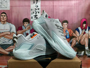 Pair of gray Nike basketball sneakers shown from the side and three-quarter angle.