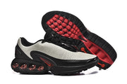 Nike Air Max DN sneakers shown from the side and outsole.