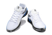 Pair of white and blue Nike basketball shoes shown from the front