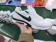 White and black Nike sneaker shown in hand; image overlay states sizes 36–50 are available