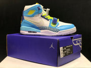 Single light-blue sneaker displayed on a purple shoe box; the box label visibly shows US Men 10, US Women 11.5, and style code CI4446-400.